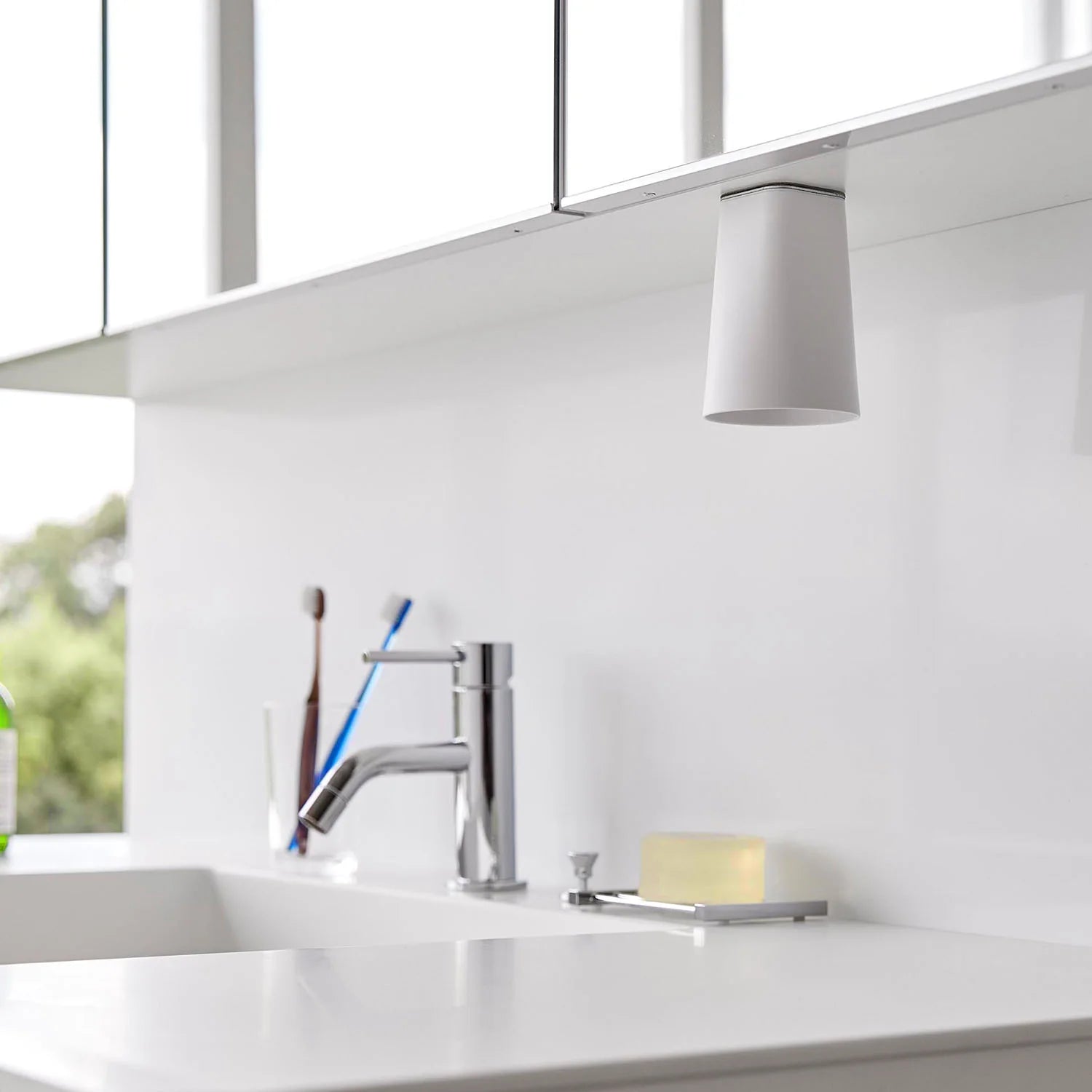 Film-attached magnetic toothbrush cup tower