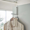 Folding door hanger tower