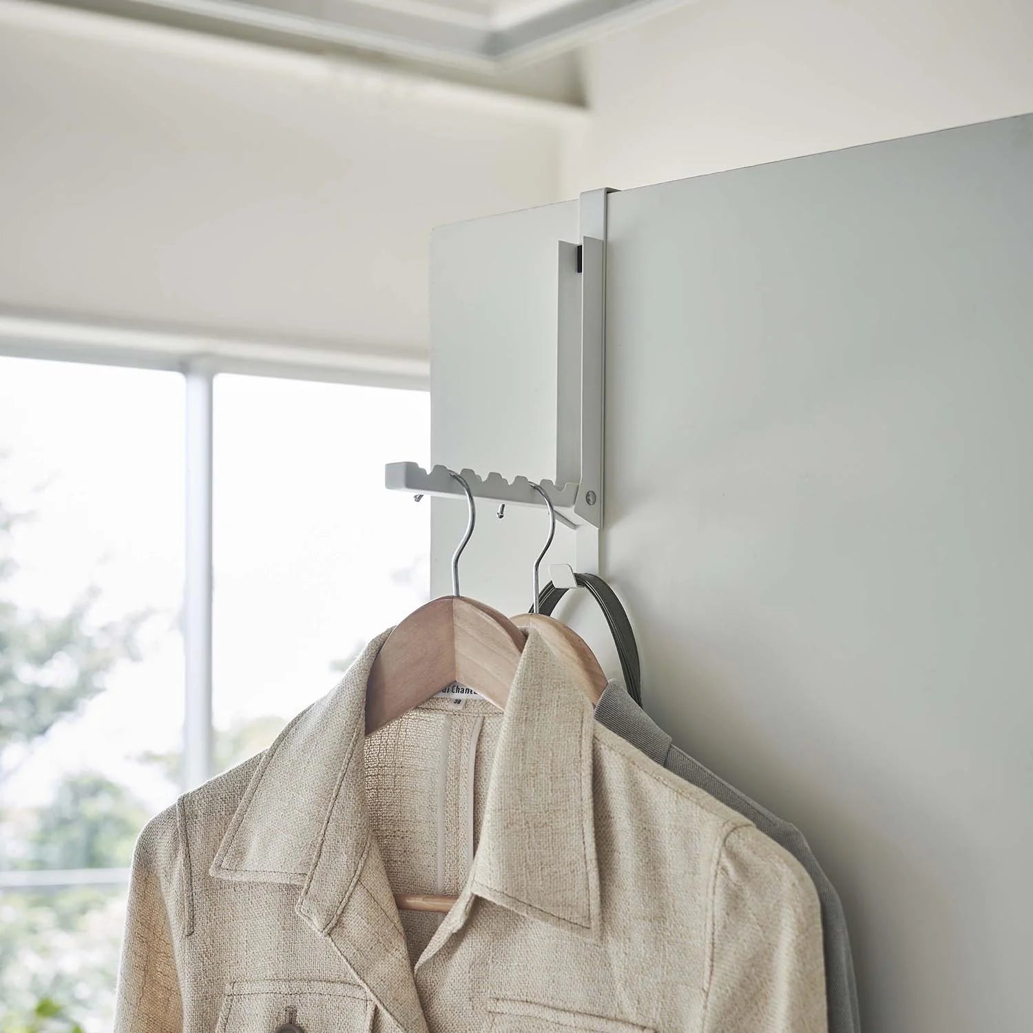Folding door hanger tower