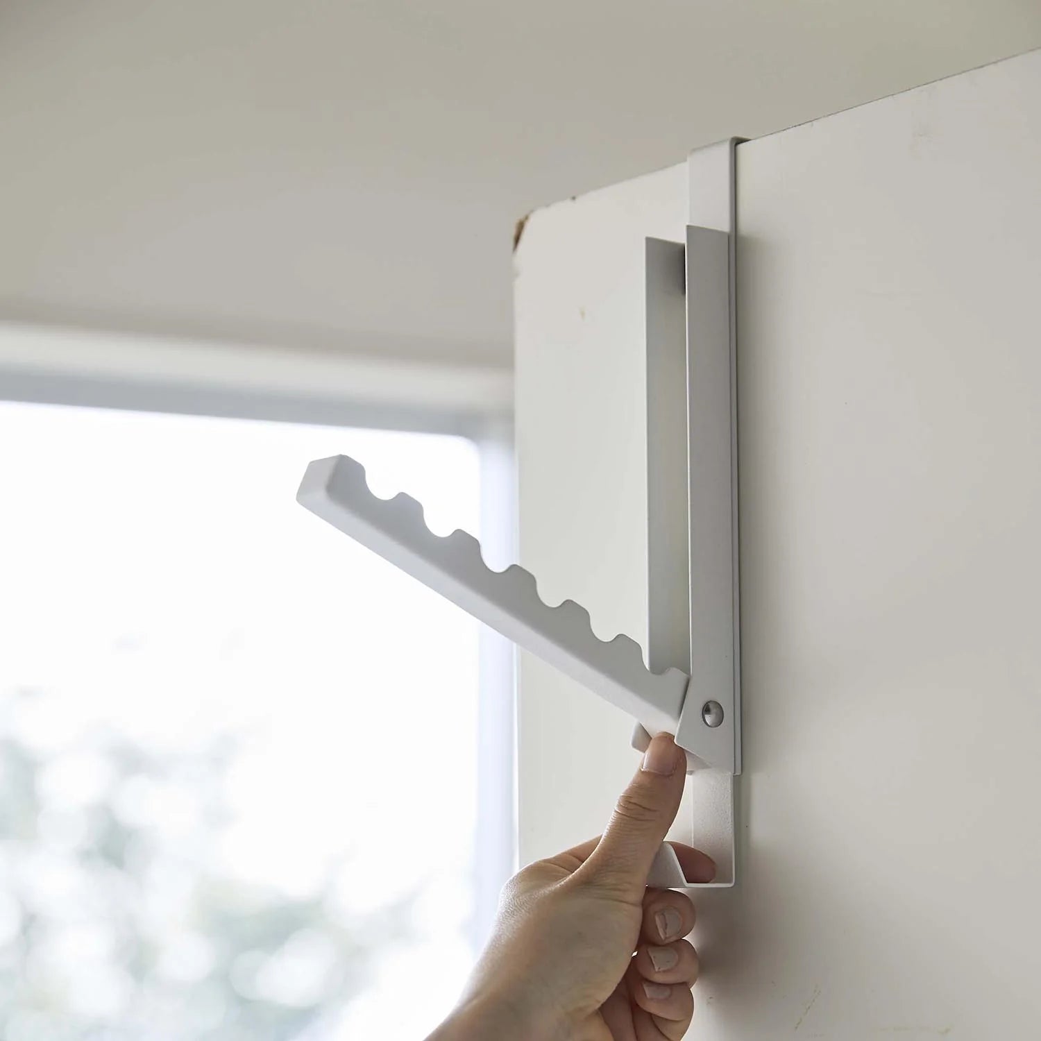 Folding door hanger tower