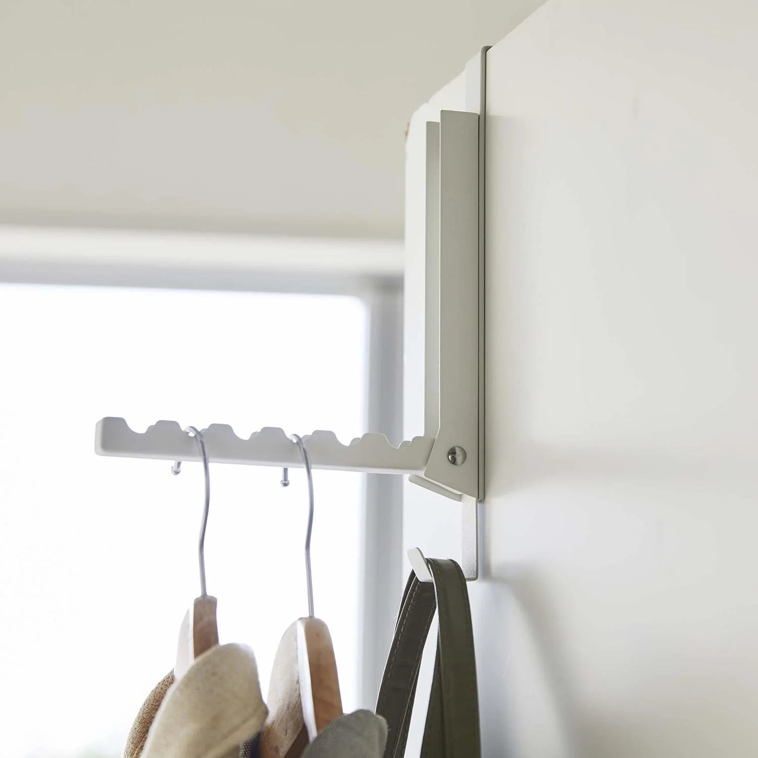Folding door hanger tower