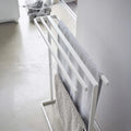 Side-hanging bath towel hanger slim tower