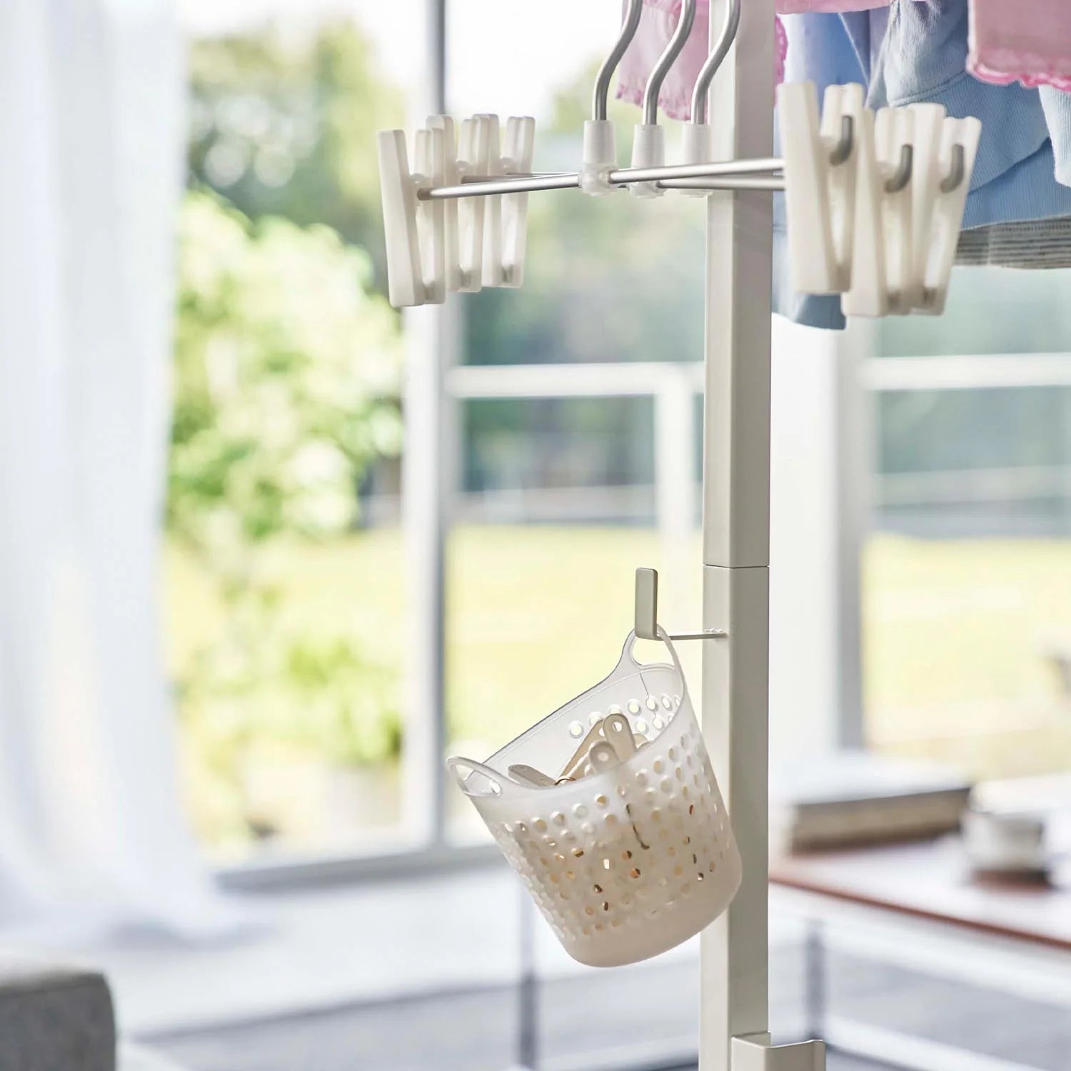 Foldable indoor clothes drying tower